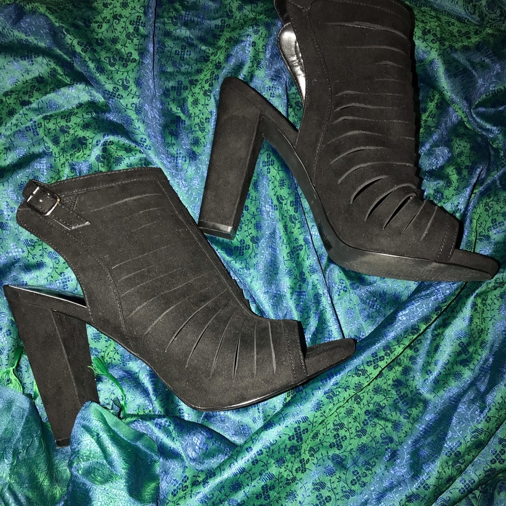Stylish and sleek black peep toe heels